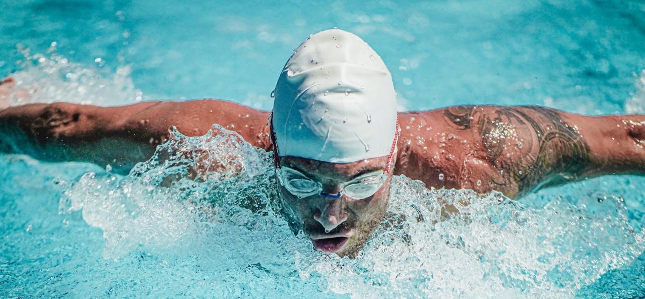 Man swimming in a swimming pool